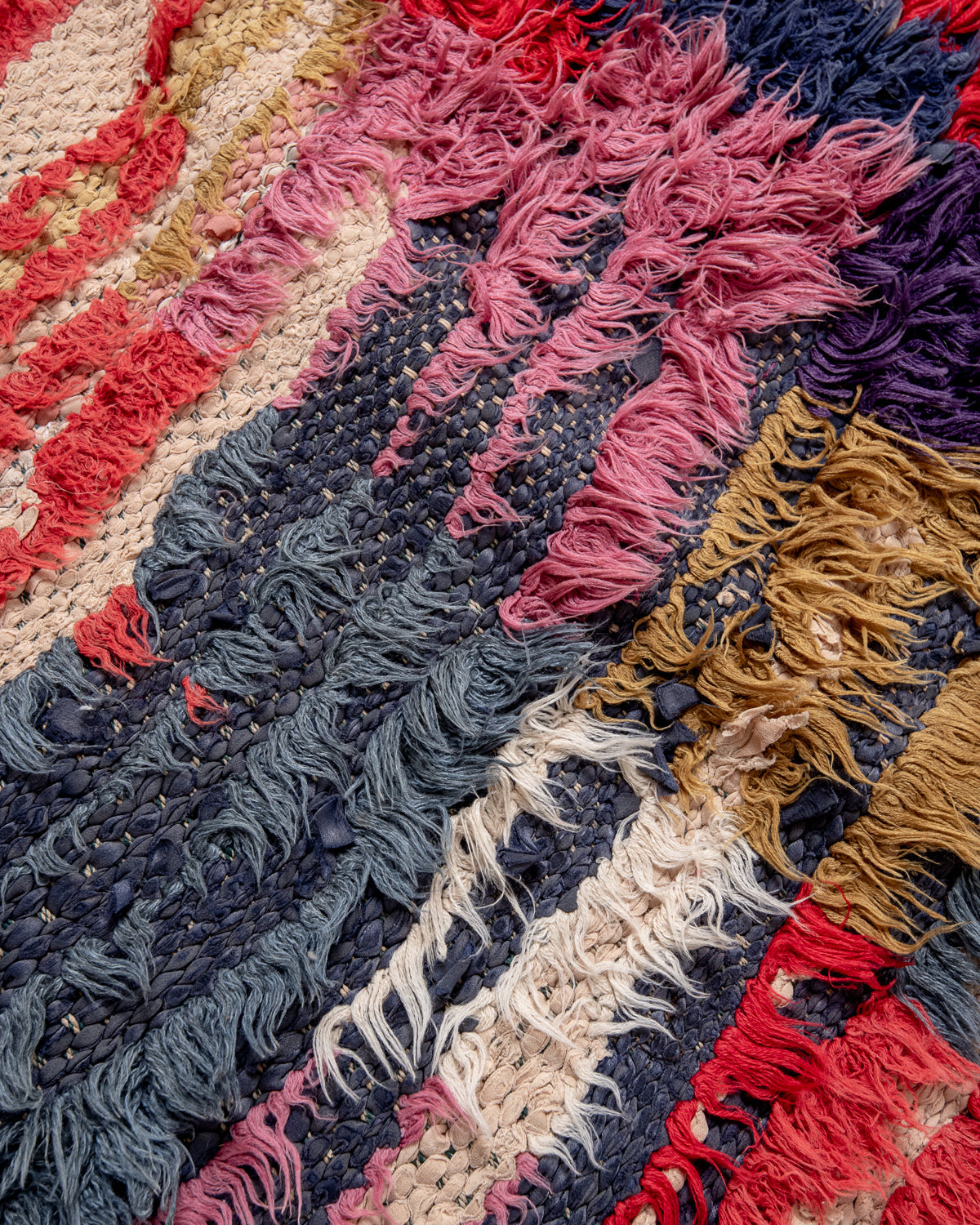 Modern designer vintage handcrafted Berber rug from Morocco. Boucherouite runner rug with beautiful colors and patterns.